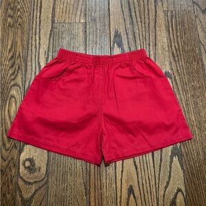 lime green brand shorts in solid red with pockets- Size 8